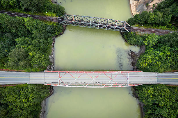 Travelling along the Yellowhead Highway between Terrace and Prince Rupert British Columbia. Scenic landscape above the Exstew River viewed by drone.