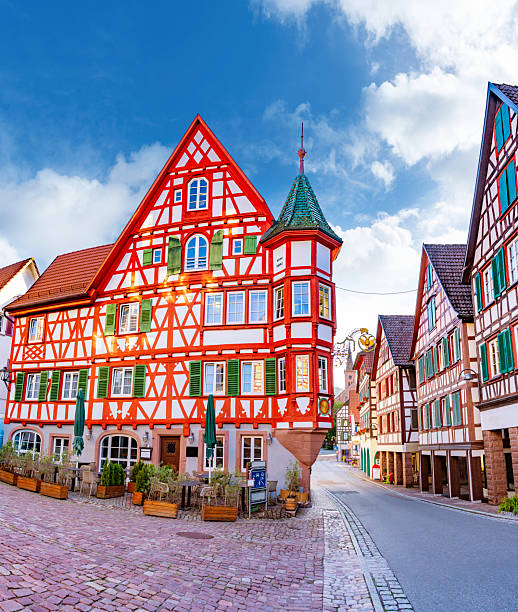 Traditional colorful half timbered facades on historic street in Schiltach village Black Forest Germany