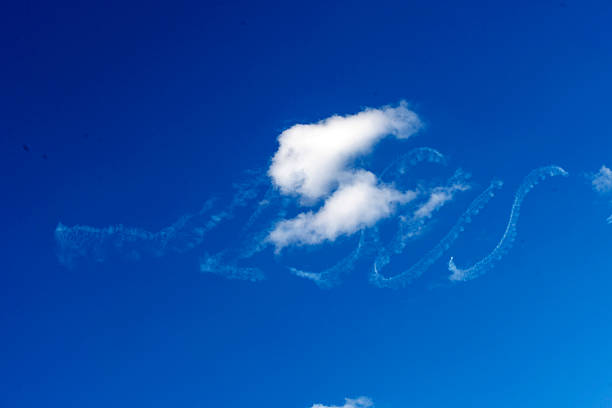 Aircraft draw a heart in the sky. Flight route of aircraft in shape of a heart. Love concept for traveling the world. Copy space for text