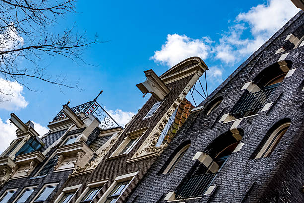 Dutch gables on a canal in Amsterdam, Holland, The Netherlands, Europe