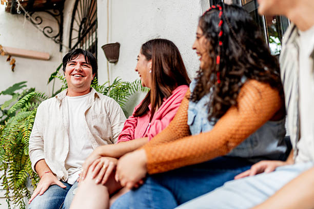 istock Young friends talking outdoors 2236808431