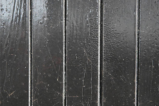 istock Dark Vertical Wooden Planks Black Painted Background Texture 2236810664