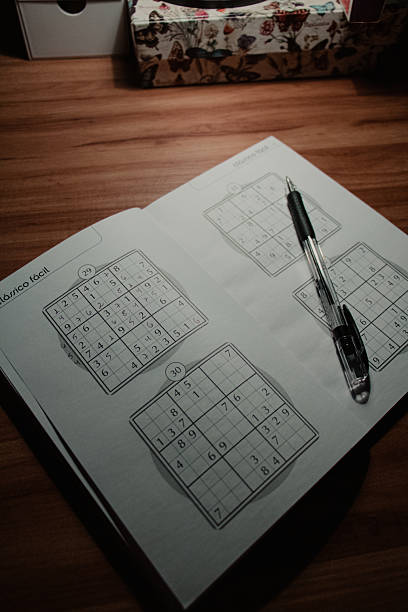 istock Sudoku Puzzle Book with a Pen 2236810884