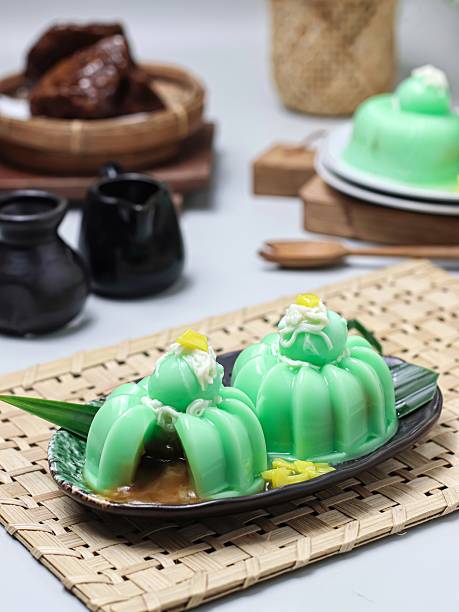 istock Klepon pudding. Creative dessert pudding inspired by Indonesian klepon, filled with liquid palm sugar and topped with shredded coconut pudding 2236811601