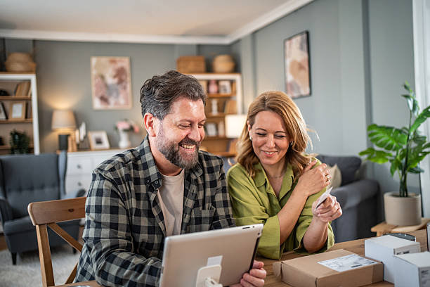 istock Happy couple online shopping using tablet at home 2236813067
