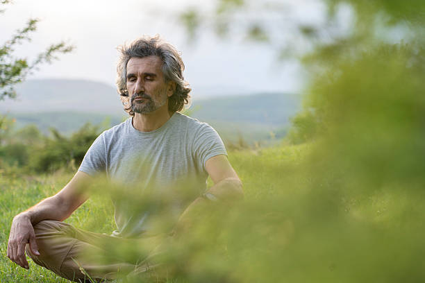 Deep Rest Travel. Man Doing Forest Meditation, Connecting With Nature