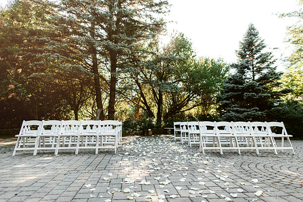White wooden chairs for guests in the park