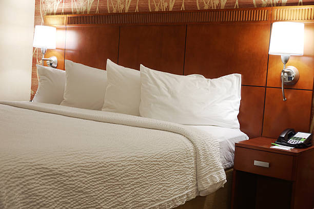 istock close up on hotel bed 2236827107