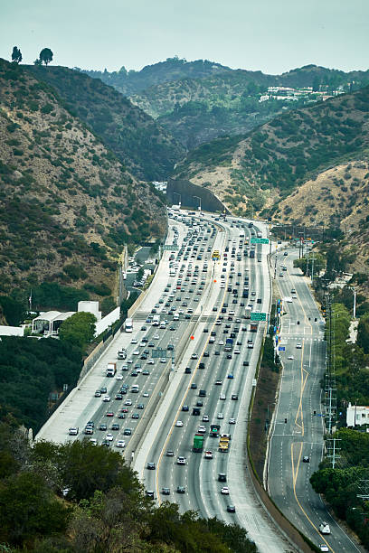 istock Freeway with heavy traffic and the mountain 2236829248