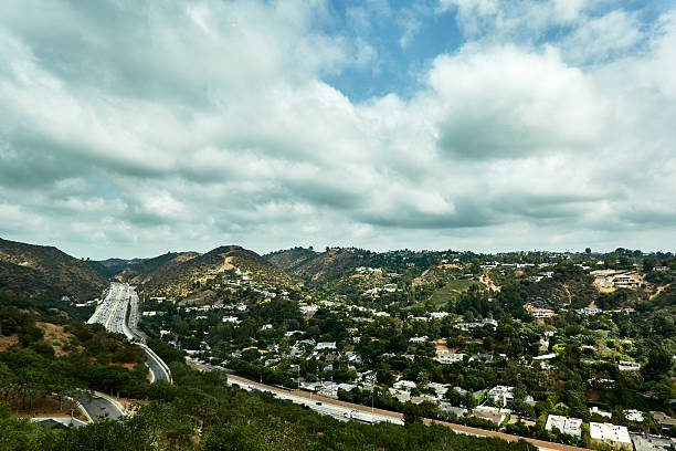 istock Freeway with heavy traffic and the mountain 2236829250