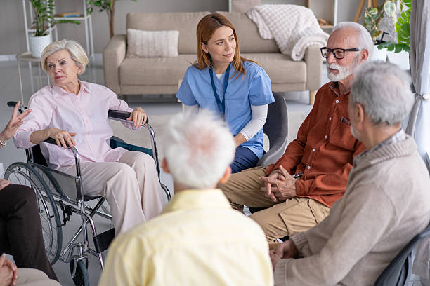 istock Seniors Sharing Stories in Relaxed Group Therapy Setting 2236829373