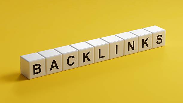 istock Backlinks - conceptual text with wooden cubes.3D rendering on yellow background. 2236829569