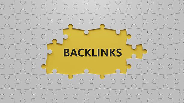 istock Backlinks - conceptual text with The white puzzle pieces with missing pieces.3D rendering on yellow background. 2236829684