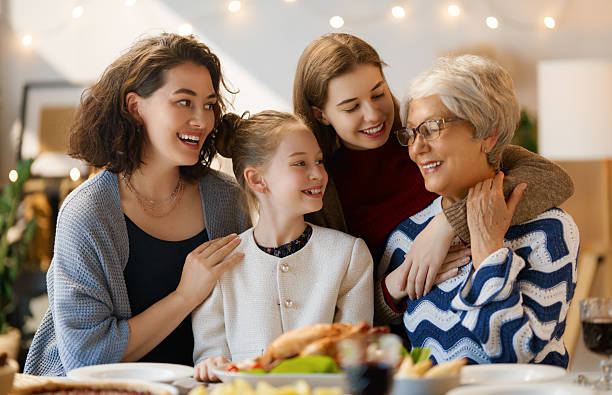 istock Family celebrating Thanksgiving Day 2236839222