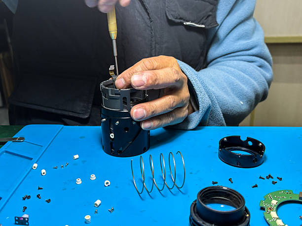 istock Repairing a camera lens 2236848380