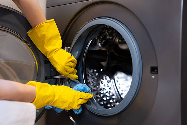 istock Hand cleaning washing machine seal 2236851007