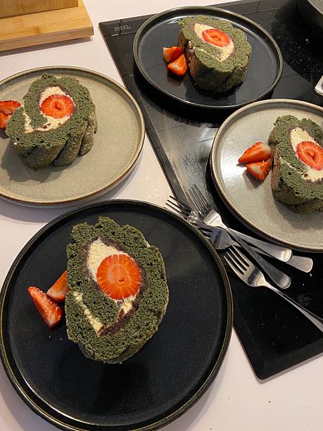 Soft and fluffy matcha roll cake with a light sponge and creamy green tea filling. A perfect balance of earthy matcha flavor and delicate sweetness for a refreshing and delightful dessert.