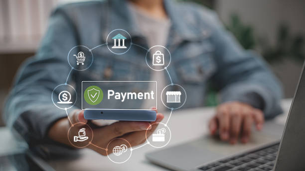 istock Hand holding smartphone with virtual secure payment icons, representing digital banking, online shopping, fintech transactions, e-commerce solutions, mobile wallet, and financial technology services. 2236856868