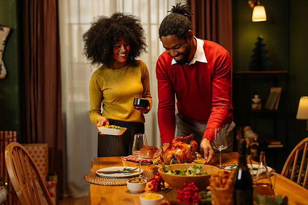 istock Smiling Couple Preparing Festive Dinner Together 2236858856