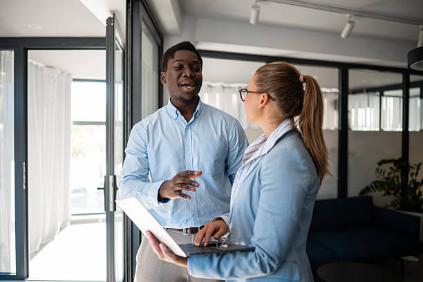 istock Business colleagues discussing project ideas in modern office 2236860532
