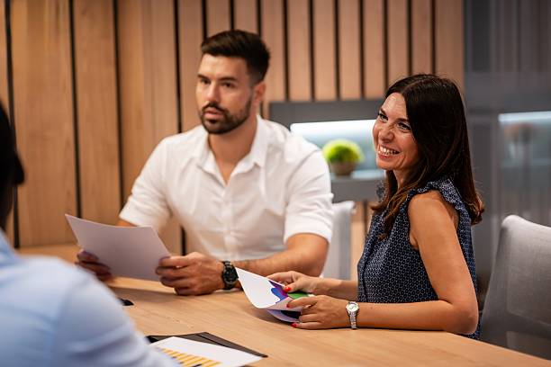 istock Business colleagues discussing documents during meeting 2236862123
