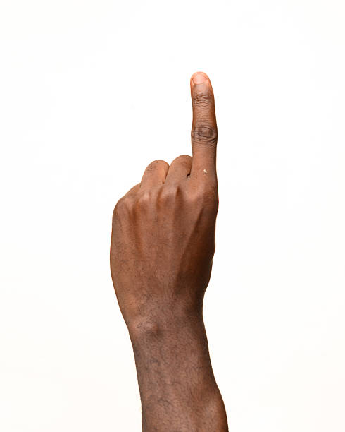 istock Raised index finger gesture with African hand on white background 2236863182