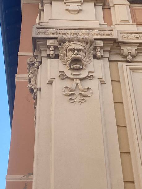 istock Allegorical Figure Head on Decorated Pillar with Egg and Dart Capital 2236863776