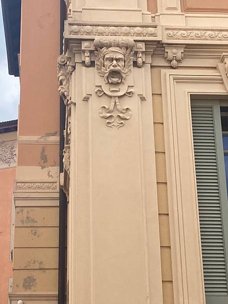 istock Allegorical Figure Head on Decorated Pillar with Egg and Dart Capital 2236863937