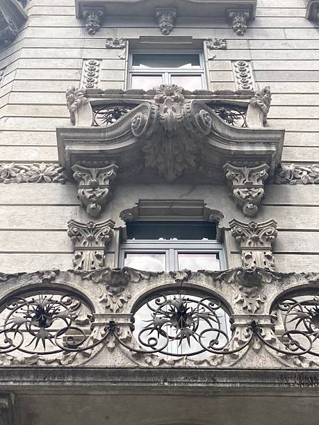 istock Decorated Wrought Iron Balcony with Window with Highly Decorated Pediment 2236863989