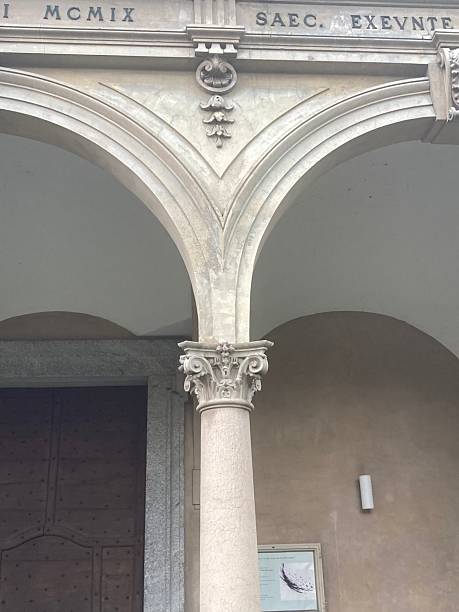 istock Arched Stone Arcade  With Shield Corinthian Relief Pillars 2236864032