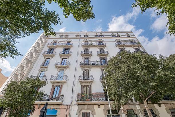 istock Classic Barcelona Eixample Building With Iron Balconies And White Facade. Historic Architecture, Urban Residential, Catalan Modernist Style, City Living 2236865730