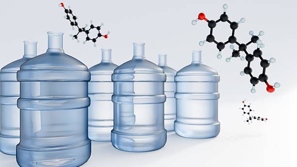 istock A 3d rendering of BPA molecule with a large plastic water gallon. 2236870575