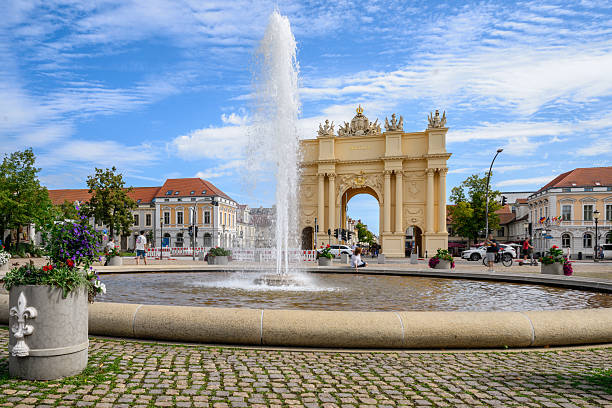 view on Brandenburg Gate and fountain in Potsdam in summer