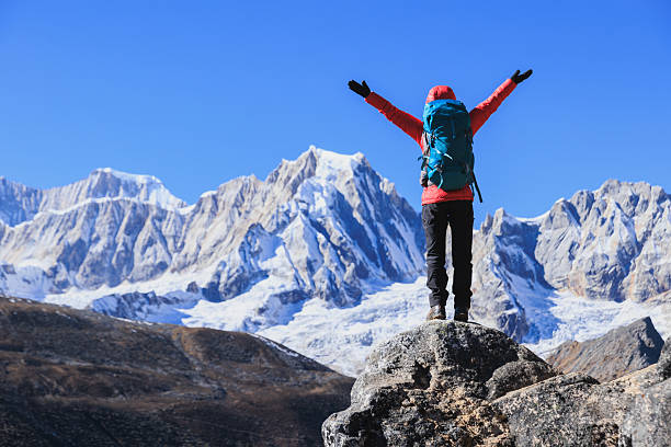 istock Backpacking woman hiking on high altitude mountain top 2236873872