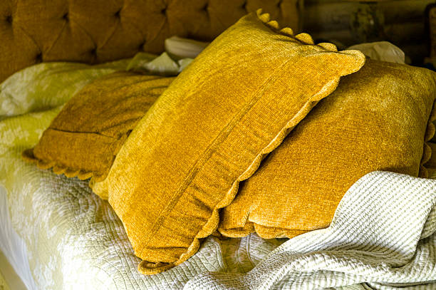 istock pile of brown velvet pillows 2236877457