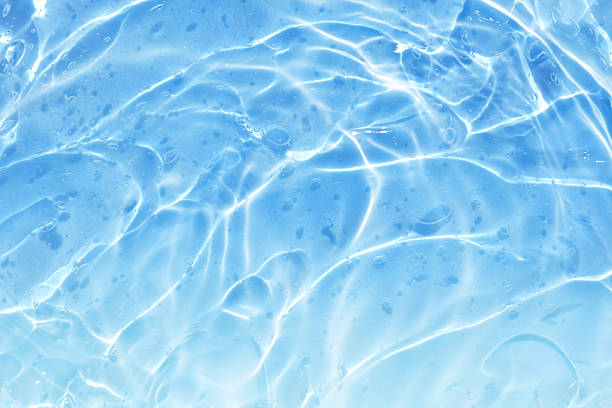 istock blue white water wave abstract. natural ripple and bubble texture. gel soap. background photography. 2236896717