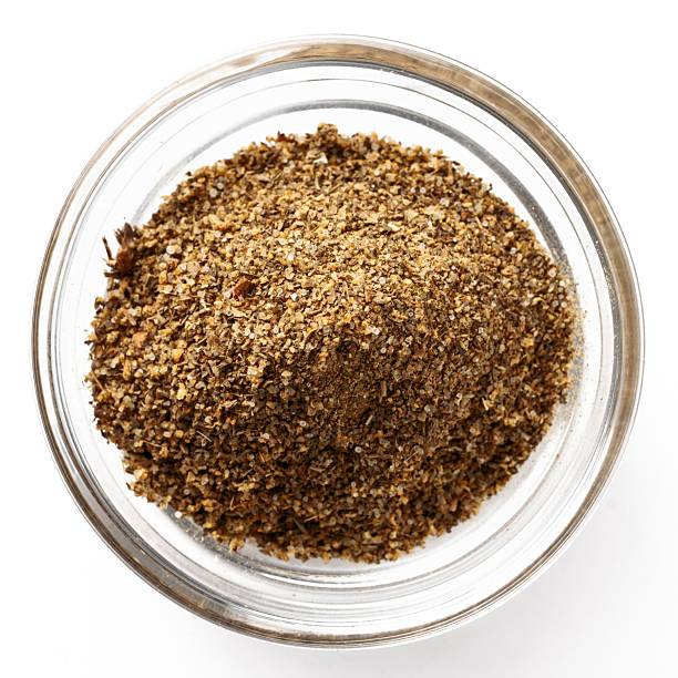 istock Ground Spice Mix in Glass Bowl on White 2236904534