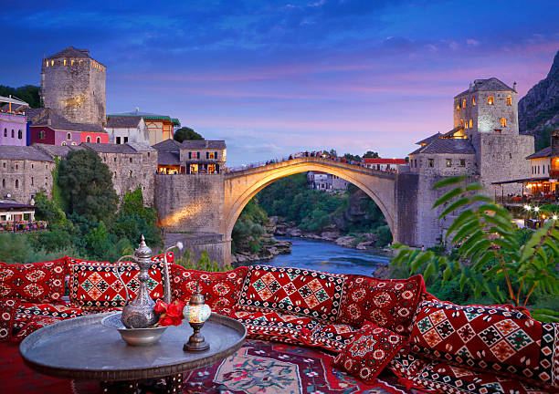 The Old Bridge and Neretva river by dusk in Mostar