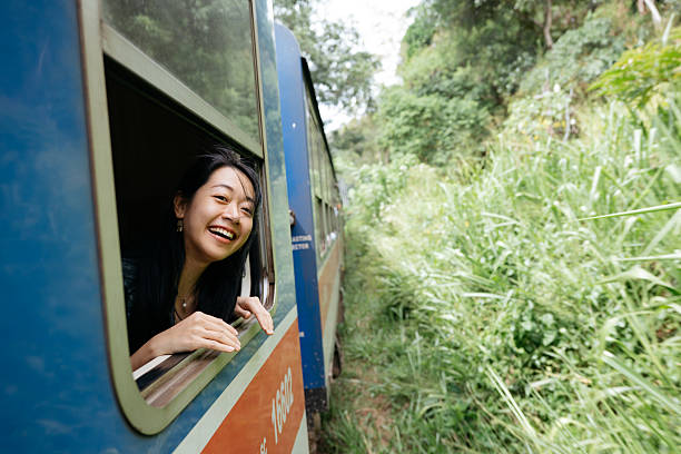 istock Tourist Enjoying Train Ride Through Tea Plantations 2236911539