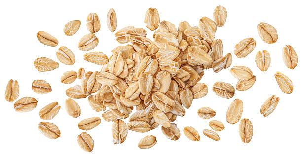 istock Flying Oat flakes  isolated on white background. Levitating Rolled oat flakes Collection. Oats set. Top view. Flat lay 2236914811