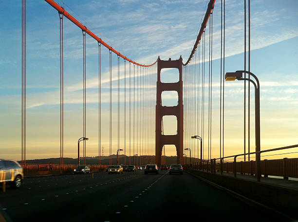 istock View of Golden Gate Bridge while driving over it at sunset 2236924264