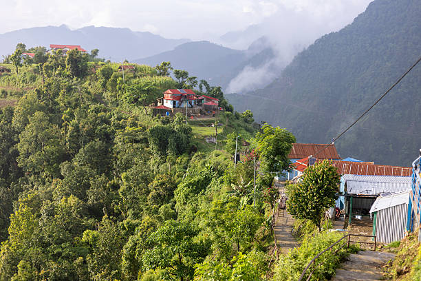 istock Hilltop Village Pathway with Red-roofed Houses 2236924353
