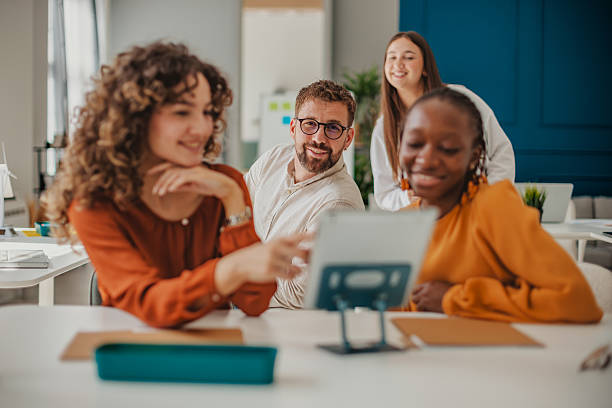 istock Young professionals collaborate in a vibrant startup office, sharing ideas and enjoying teamwork during a brainstorming session 2236925982