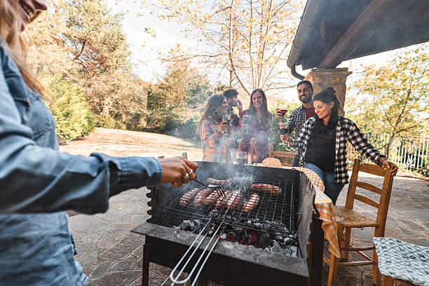 istock friends doing a bbq at home 2236926496