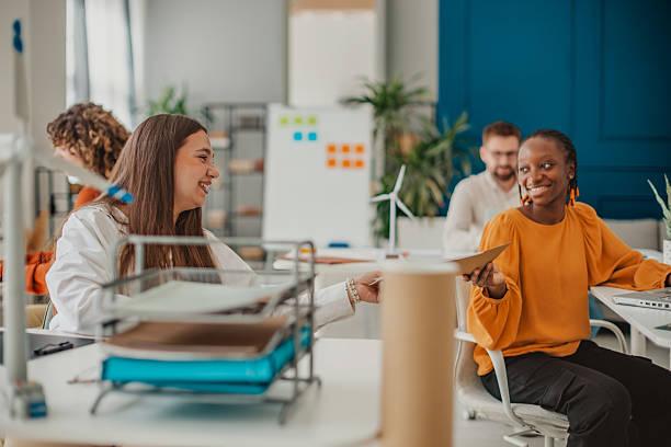 istock Young professionals collaborating in a bright startup office focused on teamwork and innovation 2236926667