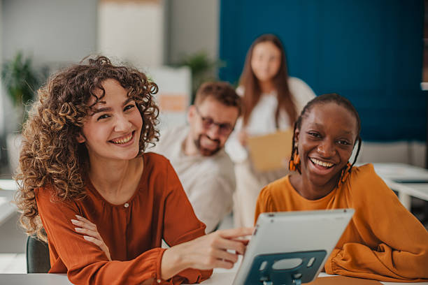 istock Young professionals collaborating in a modern startup office, sharing ideas and enjoying teamwork 2236928253