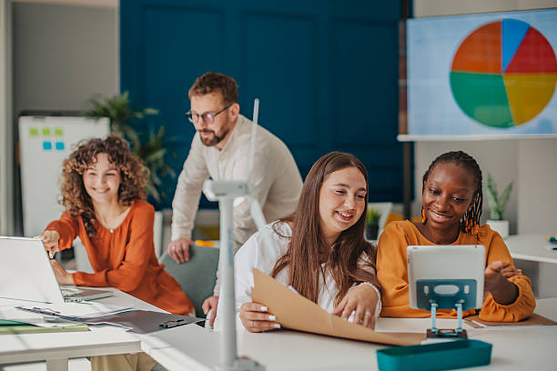 istock Young team collaborating on startup projects in a modern office filled with innovative ideas and positive energy 2236929633