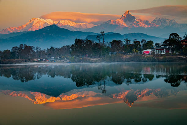 istock Sunrise over the Himalayas with Reflections on Phewa Lake 2236929862