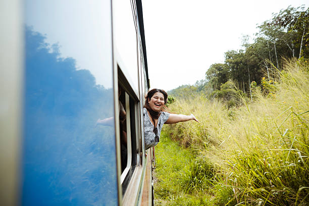 istock Tourist Enjoying Train Ride Through Tea Plantations 2236930075
