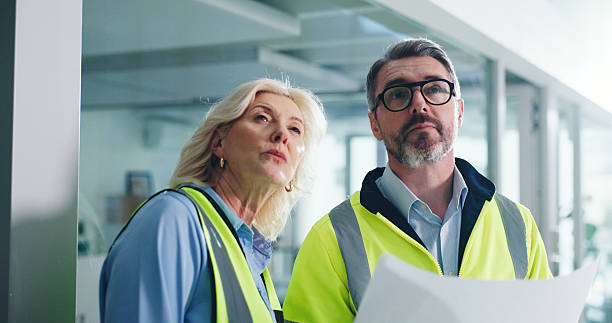 istock Thinking, architect and mature team with blueprint, inspection or planning for property development. Engineer, woman and man with document for architecture, renovation and building construction 2236931341